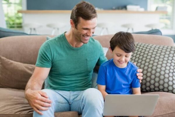 Dad Teaching His Son computer